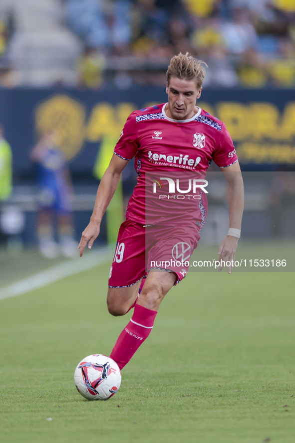 Alejandro Cantero of CD Tenerife runs with the ball during the Liga Hypermotion match between Cadiz CF and CD Tenerife at Nuevo Mirandilla i...