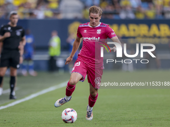 Alejandro Cantero of CD Tenerife runs with the ball during the Liga Hypermotion match between Cadiz CF and CD Tenerife at Nuevo Mirandilla i...