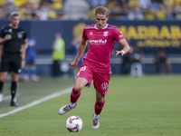 Alejandro Cantero of CD Tenerife runs with the ball during the Liga Hypermotion match between Cadiz CF and CD Tenerife at Nuevo Mirandilla i...