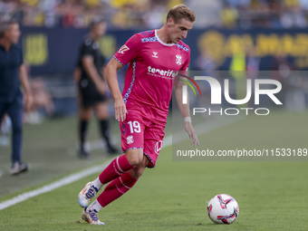 Alejandro Cantero of CD Tenerife runs with the ball during the Liga Hypermotion match between Cadiz CF and CD Tenerife at Nuevo Mirandilla i...