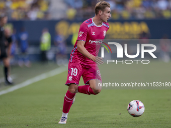 Alejandro Cantero of CD Tenerife runs with the ball during the Liga Hypermotion match between Cadiz CF and CD Tenerife at Nuevo Mirandilla i...