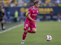 Alejandro Cantero of CD Tenerife runs with the ball during the Liga Hypermotion match between Cadiz CF and CD Tenerife at Nuevo Mirandilla i...