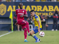 Yussi Diarra of CD Tenerife battles for the ball during the Liga Hypermotion match between Cadiz CF and CD Tenerife at Nuevo Mirandilla in S...