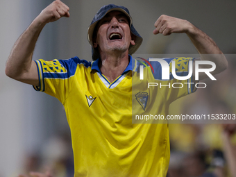 Fans of Cadiz CF celebrate a goal during the Liga Hypermotion match between Cadiz CF and CD Tenerife at Nuevo Mirandilla in Seville, Spain,...