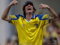 Fans of Cadiz CF celebrate a goal during the Liga Hypermotion match between Cadiz CF and CD Tenerife at Nuevo Mirandilla in Seville, Spain,...