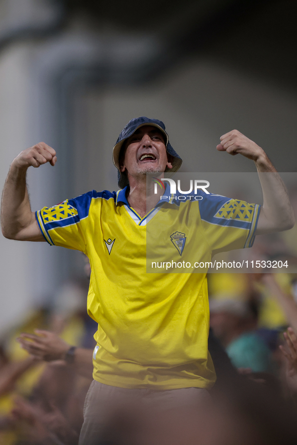 Fans of Cadiz CF celebrate a goal during the Liga Hypermotion match between Cadiz CF and CD Tenerife at Nuevo Mirandilla in Seville, Spain,...