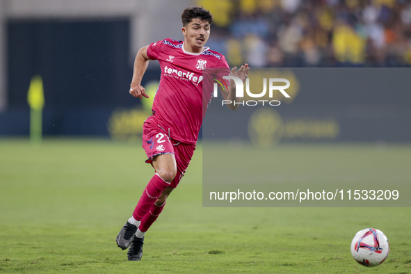 Alassan of CD Tenerife runs with the ball during the Liga Hypermotion match between Cadiz CF and CD Tenerife at Nuevo Mirandilla in Seville,...