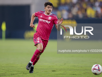 Alassan of CD Tenerife runs with the ball during the Liga Hypermotion match between Cadiz CF and CD Tenerife at Nuevo Mirandilla in Seville,...