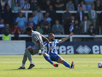 Braintree Town's Kyrell Lisbie is in action with Hartlepool United's Kieron Freeman during the Vanarama National League match between Hartle...