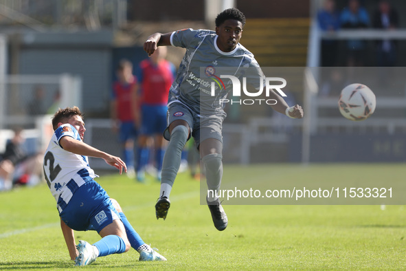 Hartlepool United's Joe Grey is in action with Braintree Town's Kyrell Lisbie during the Vanarama National League match between Hartlepool U...