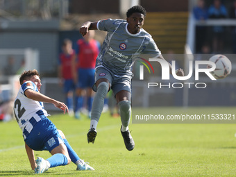 Hartlepool United's Joe Grey is in action with Braintree Town's Kyrell Lisbie during the Vanarama National League match between Hartlepool U...