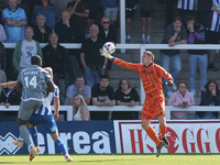 Hartlepool United's Joel Dixon saves from Braintree Town's John Akinde during the Vanarama National League match between Hartlepool United a...