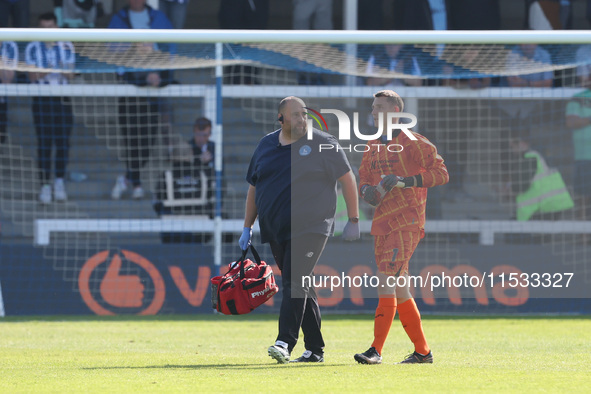 Hartlepool United physiotherapist Danny O'Connor and Joel Dixon during the Vanarama National League match between Hartlepool United and Brai...