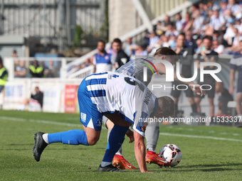 David Ferguson of Hartlepool United battles for possession with Tom Blackwell of Braintree Town during the Vanarama National League match be...