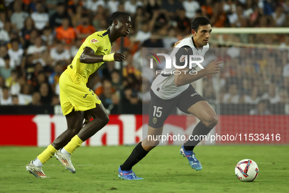 Cesar Tarrega of Valencia CF (R) during the La Liga match between Valencia CF and Villarreal CF at Mestalla Stadium in Valencia, Spain, on A...