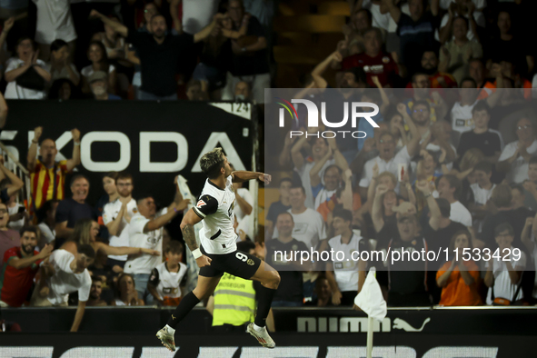 Hugo Duro of Valencia CF celebrates after scoring the 1-0 goal during the La Liga match between Valencia CF and Villarreal CF at Mestalla St...