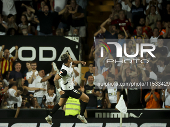 Hugo Duro of Valencia CF celebrates after scoring the 1-0 goal during the La Liga match between Valencia CF and Villarreal CF at Mestalla St...