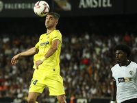 Villarreal's Santi Comesana (left) and Thierry Correia of Valencia CF during the La Liga match between Valencia CF and Villarreal CF at Mest...