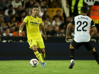 Villarreal's Kiko Femenia (L) and Luis Rioja of Valencia CF during the La Liga match between Valencia CF and Villarreal CF at Mestalla Stadi...