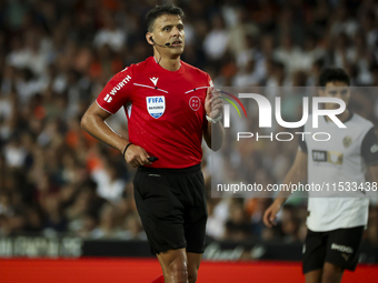 Jesus Gil Manzano referees during the La Liga match between Valencia CF and Villarreal CF at Mestalla Stadium in Valencia, Spain, on August...