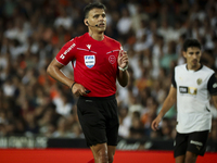 Jesus Gil Manzano referees during the La Liga match between Valencia CF and Villarreal CF at Mestalla Stadium in Valencia, Spain, on August...