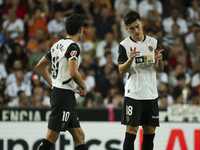 Andre Almeida of Valencia CF (left) and Pepelu, Jose Luis Garcia Vaya, of Valencia CF during the La Liga match between Valencia CF and Villa...