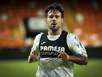 Juan Bernat of Villarreal CF and Ruben Baraja after the La Liga match between Valencia CF and Villarreal CF at Mestalla Stadium in Valencia,...