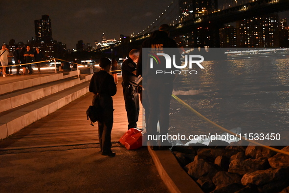 Bone fragments are recovered along the shoreline in Brooklyn Bridge Park in Brooklyn, New York, United States, on August 31, 2024. At approx...