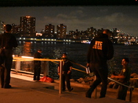 Bone fragments are recovered along the shoreline in Brooklyn Bridge Park in Brooklyn, New York, United States, on August 31, 2024. At approx...