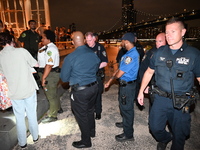 Bone fragments are recovered along the shoreline in Brooklyn Bridge Park in Brooklyn, New York, United States, on August 31, 2024. At approx...