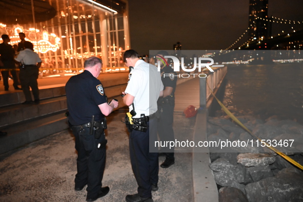 Bone fragments are recovered along the shoreline in Brooklyn Bridge Park in Brooklyn, New York, United States, on August 31, 2024. At approx...