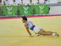 Artistic Gymnastics athlete from DKI Jakarta, Joseph Judah Hatoguan (21), competes in the first round of the men's group match at the Dispor...