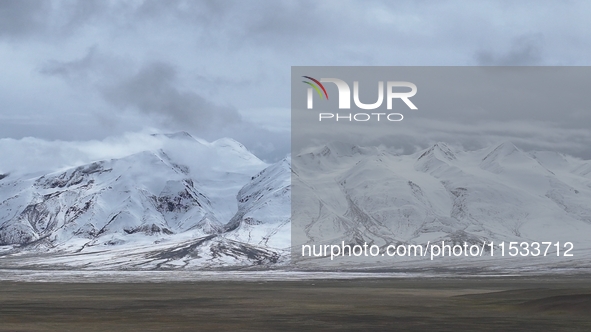 A view of the glacier at Tanggula Pass on the border between Qinghai and Tibet in Nagqu, Tibet, China, on August 7, 2024. 