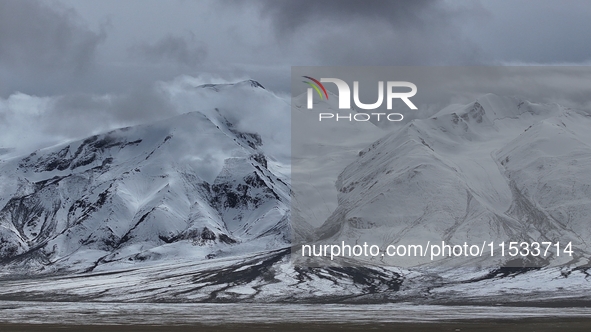 A view of the glacier at Tanggula Pass on the border between Qinghai and Tibet in Nagqu, Tibet, China, on August 7, 2024. 