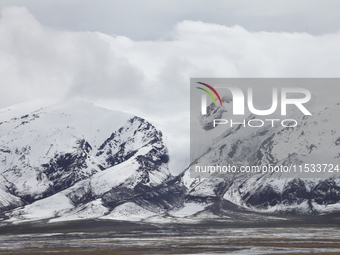 A view of the glacier at Tanggula Pass on the border between Qinghai and Tibet in Nagqu, Tibet, China, on August 7, 2024. (