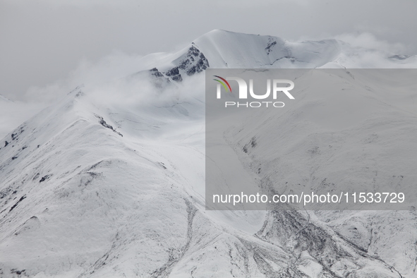 A view of the glacier at Tanggula Pass on the border between Qinghai and Tibet in Nagqu, Tibet, China, on August 7, 2024. 