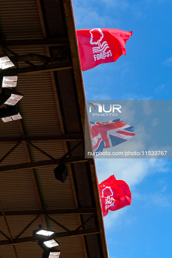 Forest crest and Union flags wave in the wind during the Premier League match between Nottingham Forest and Wolverhampton Wanderers at the C...