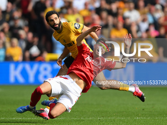 Neco Williams of Nottingham reacts after Rayan Ait-Nouri of Wolverhampton Wanderers commits a foul during the Premier League match between N...