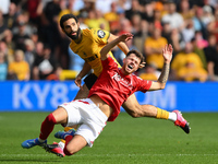 Neco Williams of Nottingham reacts after Rayan Ait-Nouri of Wolverhampton Wanderers commits a foul during the Premier League match between N...