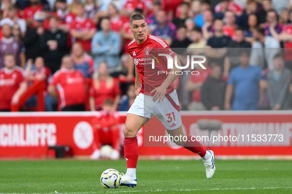 Nikola Milenkovic of Nottingham Forest looks for options during the Premier League match between Nottingham Forest and Wolverhampton Wandere...