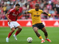 Mario Lemina of Wolverhampton Wanderers is under pressure from Morgan Gibbs-White of Nottingham Forest during the Premier League match betwe...