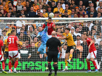 Murillo of Nottingham Forest heads the ball clear under pressure from Jorgen Strand Larsen of Wolverhampton Wanderers during the Premier Lea...