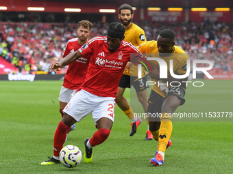 Anthony Elanga of Nottingham Forest is under pressure from Toti Gomes of Wolverhampton Wanderers during the Premier League match between Not...