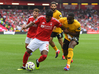 Anthony Elanga of Nottingham Forest is under pressure from Toti Gomes of Wolverhampton Wanderers during the Premier League match between Not...