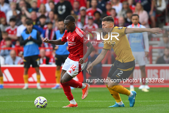 Callum Hudson-Odoi of Nottingham Forest is under pressure from Matt Doherty of Wolverhampton Wanderers during the Premier League match betwe...