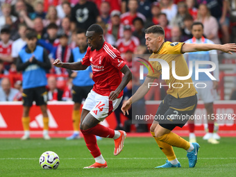 Callum Hudson-Odoi of Nottingham Forest is under pressure from Matt Doherty of Wolverhampton Wanderers during the Premier League match betwe...