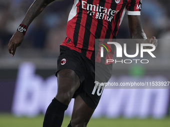 Rafael Leao of AC Milan is in action during the Serie A match between Lazio and Milan at Stadio Olimpico in Rome, Italy, on August 31, 2024....