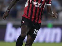 Rafael Leao of AC Milan is in action during the Serie A match between Lazio and Milan at Stadio Olimpico in Rome, Italy, on August 31, 2024....