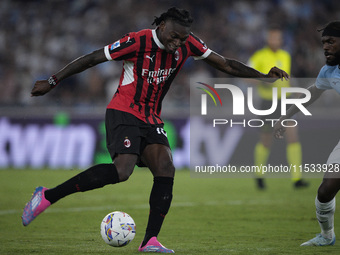 Rafael Leao of AC Milan scores a goal during the Serie A match between Lazio and Milan at Stadio Olimpico in Rome, Italy, on August 31, 2024...