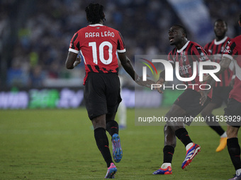 Rafael Leao of AC Milan celebrates after scoring a goal with Youssouf Fofana of AC Milan during the Serie A match between Lazio and Milan at...